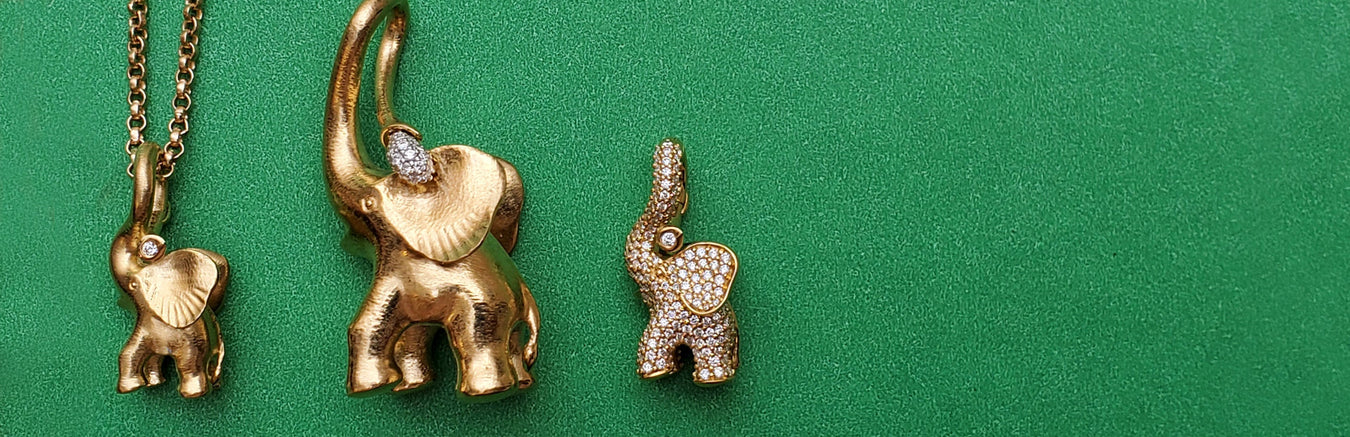 Ole Lynggaard of Copenhagen | Iconic elephant pendant | The lotus, nature, snake, star collections. Shop Online at OsterJewelers.com