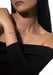 Model wearing Messika Move Uno Pavé 18K Rose Gold Diamond Necklace & Bracelet in black top