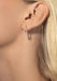 Closeup of blonde model wearing a single Messika Move Uno Stud 18KRG Diamond Dangle Earring