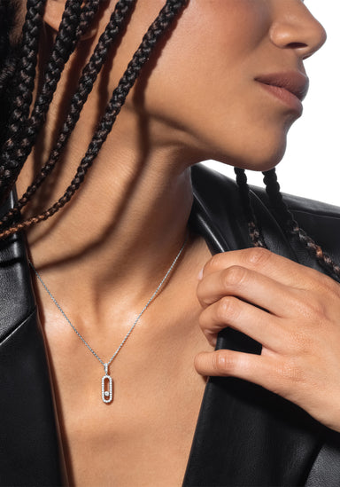 Closeup of Messika Move Uno Pavé LM 18KWG Diamond Necklace on a Black model in a black blazer