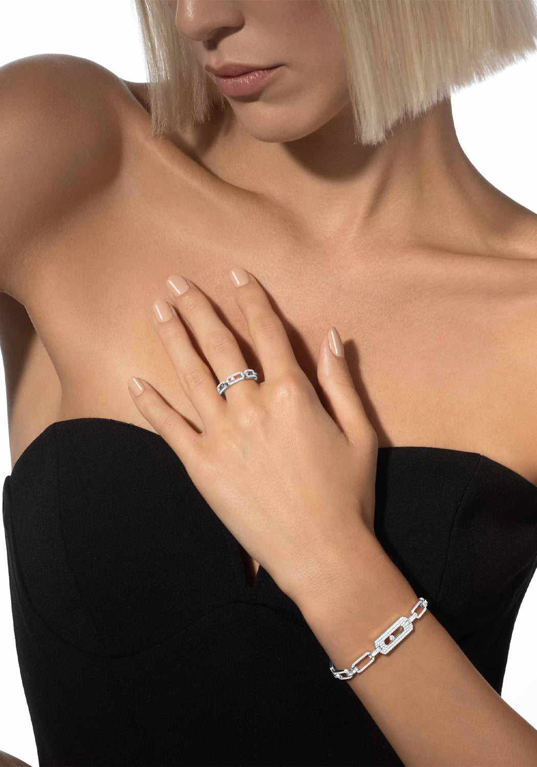 Model with blonde bob wearing a Messika My Move Pavé 18KWG Diamond Link Bracelet & My Move ring