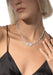 Messika Move Link Full 18KWG Pavé Diamond Chain Necklace on a blonde model in a black tank.