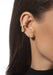 Closeup of a model wearing Messika Move Uno 18KYG Diamond Stud Earrings Styled with 2nd Pair