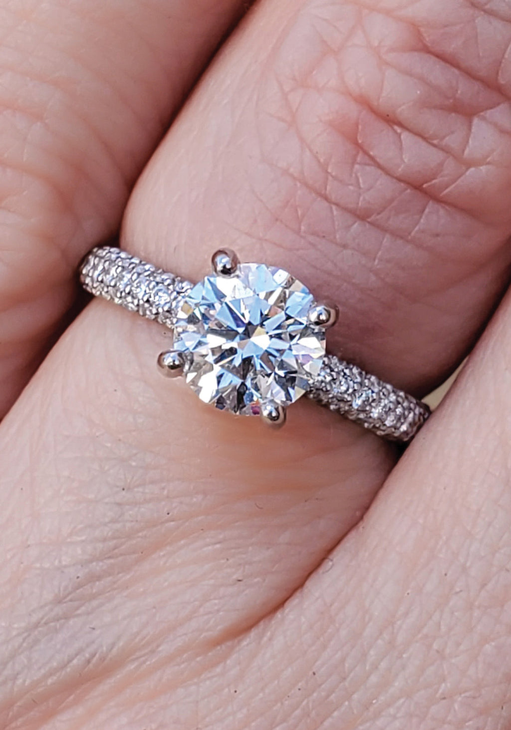 Precision Set Platinum Row Shank Round Diamond Ring