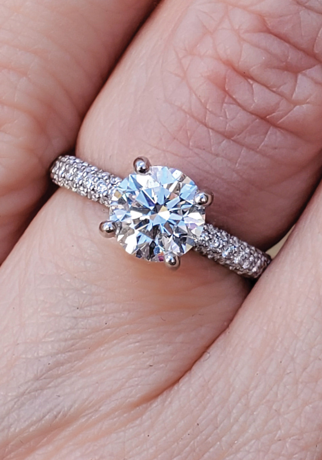 Precision Set Platinum Row Shank Round Diamond Ring