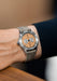 The tectyre of the Angelus Chronographe Tachymètre Steel Pink is highlighted on a man's wrist.