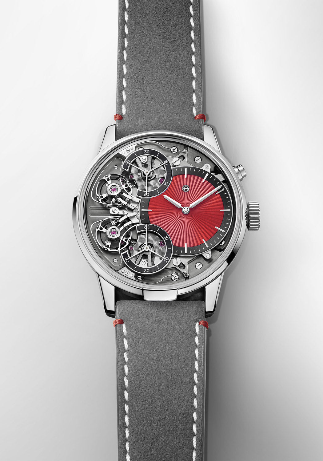 Front full view of the Armin Strom Mirrored Force Resonance Red on a grey Alcantara strap