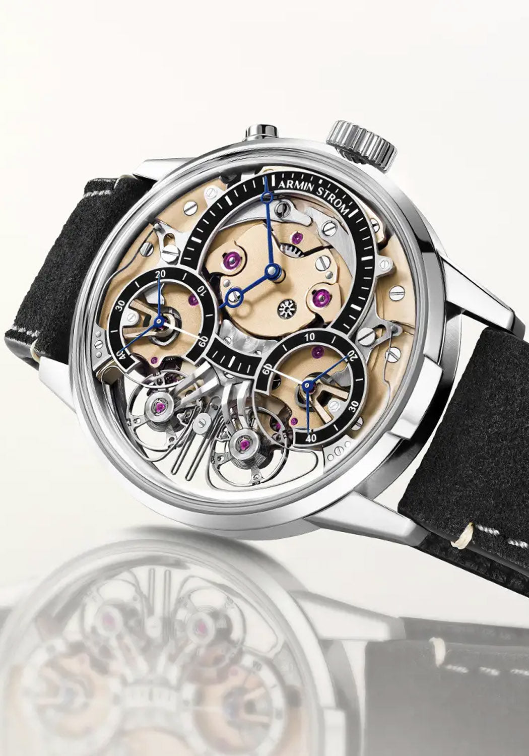 Armin Strom Mirrored Force Resonance Zeitgeist 1665 3N shows the mainplate & bridges in 3N gold 
