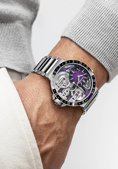 The Armin Strom Orbit Midnight Purple shown off on a man's wrist | OsterJewelers.com