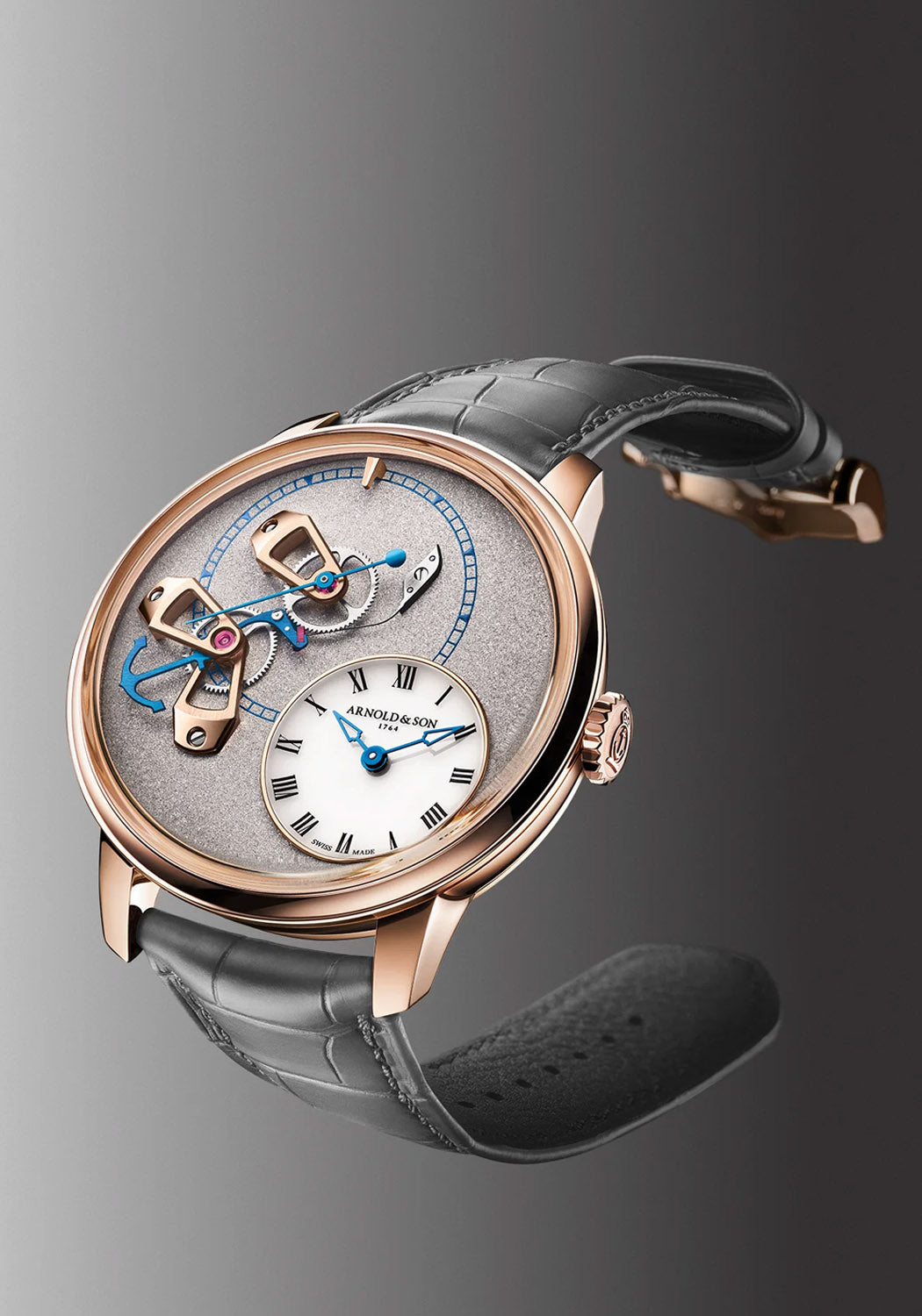 The Arnold & Son DSTB Stop-Seconds Red Gold Cliff Grey features a grained dial