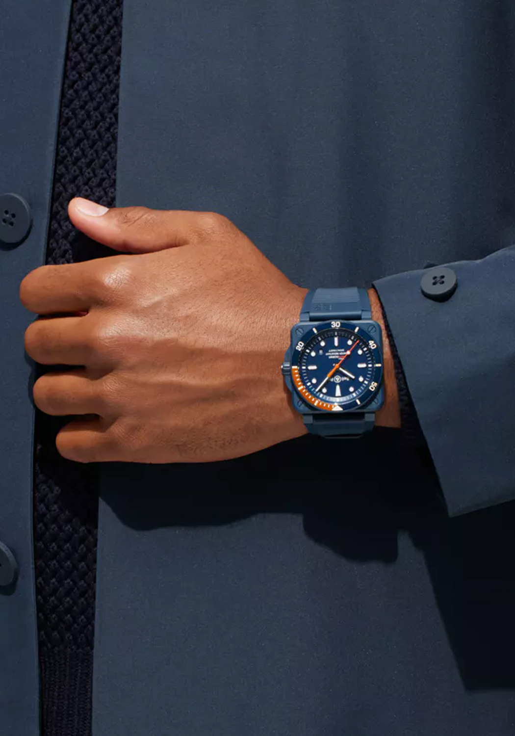 Bell & Ross BR03-02 Blue Diver Tara on wrist with casual business attire | OsterJewelers.com