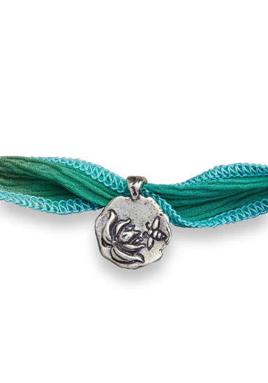 Catherine Michiels Sterling Silver Acceptance Charm on Silk Wrap | Denver | OsterJewelers.com