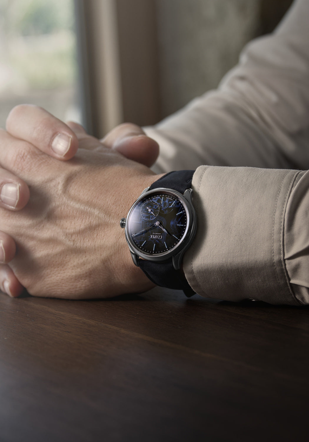 The fumé sapphire dial reveals the inner skeleton of the Czapek Promenade Transparencies Aqua Blue