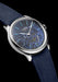 Side view of the Czapek Promenade Transparencies Aqua Blue on a black background