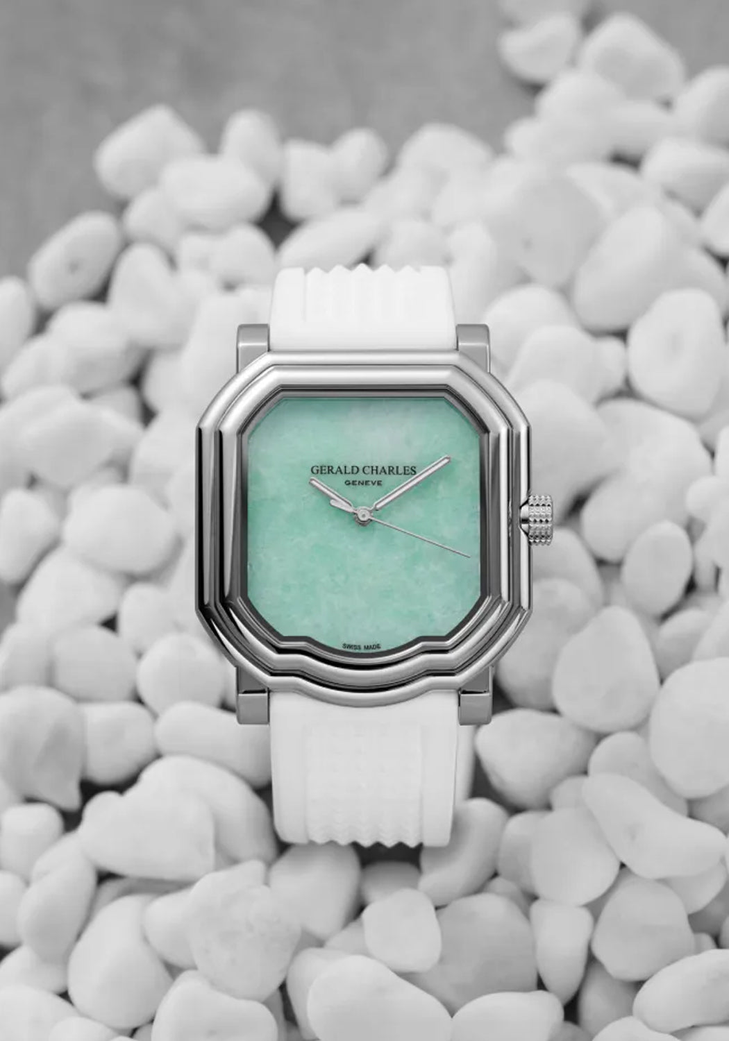 Gerald Charles Maestro 2.0 Ultra-Thin Jade with a white rubber strap on a white pebble background.