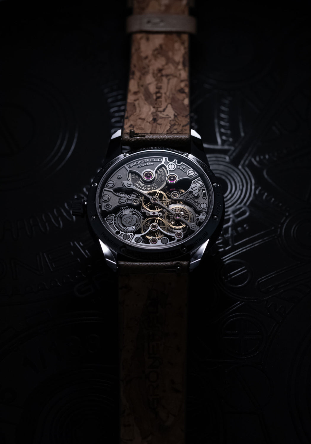 A stylized caseback image of the Grönefeld 1941 Quadrivium Platinum