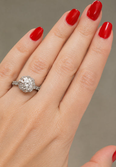Woman's Hand with red nail polish wearing Katharine James diamond semi mount ring from Osterjewelers.com