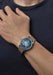 The Louis Erard Marqueterie de Paille on a man's wrist | Ref. 34248AA45.BVA158 | OsterJewelers.com