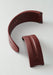 The MING FKM Brick Red Rubber Strap shown on its side in two separate pieces on a light background.
