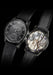 Front & back of Moritz Grossmann Benu Power Reserve Black Stainless Steel DLC on a black background