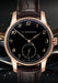 Rendering of the Moritz Grossmann Hamatic Enamel Rose Gold on dark background