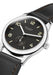 The dial reveals the bold hour markers highlighted by yellow and treated with superluminova