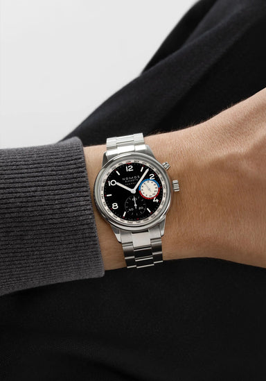 The NOMOS Club Sport Neomatik Worldtimer Dark brings a sporty aesthetic to a man's wrist