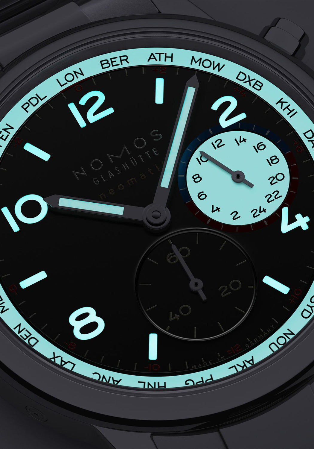 The NOMOS Club Sport Neomatik Worldtimer Dark features an off-white superluminova that shines bright