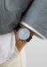 NOMOS Metro Date Power Reserve Ice Blue on a man's wrist | Denver Watches | OsterJewelers.com