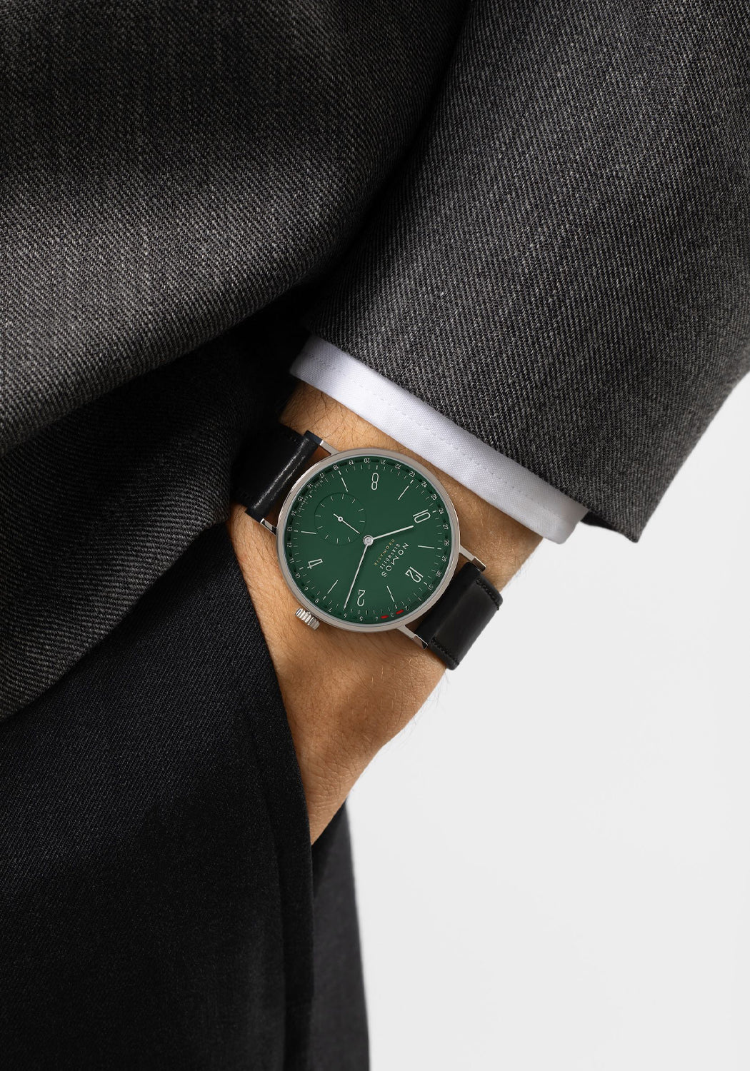 NOMOS Tangente Neomatik 38 Update Forest Green on the wrist | Ref. 148 | OsterJewelers.com