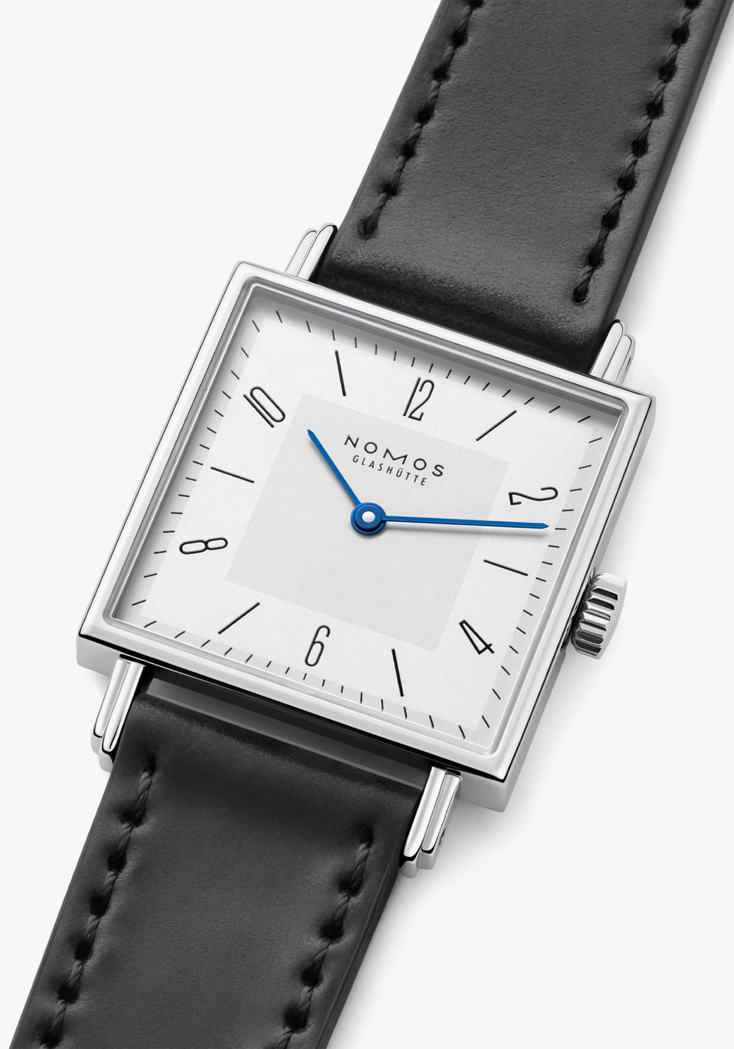 Angled view of the NOMOS Tetra 27 Duo highlights the white dial and smaller centered grey square.