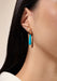 Model wearing Turquoise Cabochon Earring Pendant Drops with a pair of earrings (Sold Separately)