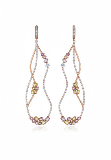 Fancy colored diamond dangles. Open curved design.