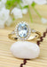 Parade Design 18KYG Diamond Halo Oval Aquamarine Ring | Denver Bridal | OsterJewelers.com