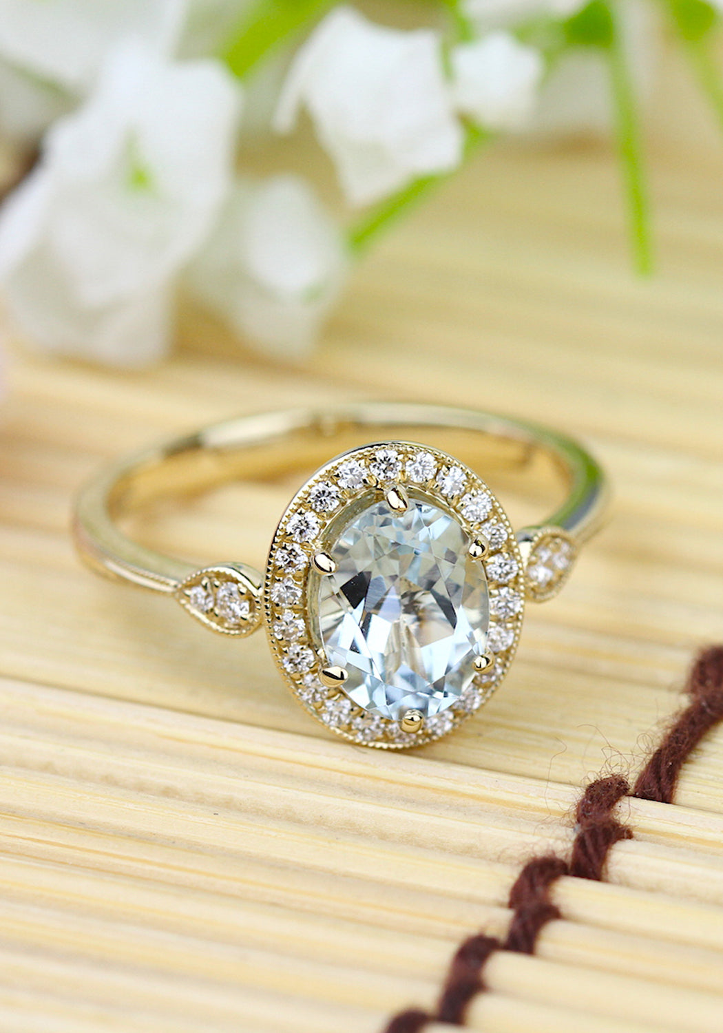 Parade Design 18KYG Diamond Halo Oval Aquamarine Ring | Denver Bridal | OsterJewelers.com