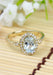 Parade Design 18KYG Diamond Halo Oval Aquamarine Ring | Denver Bridal | OsterJewelers.com