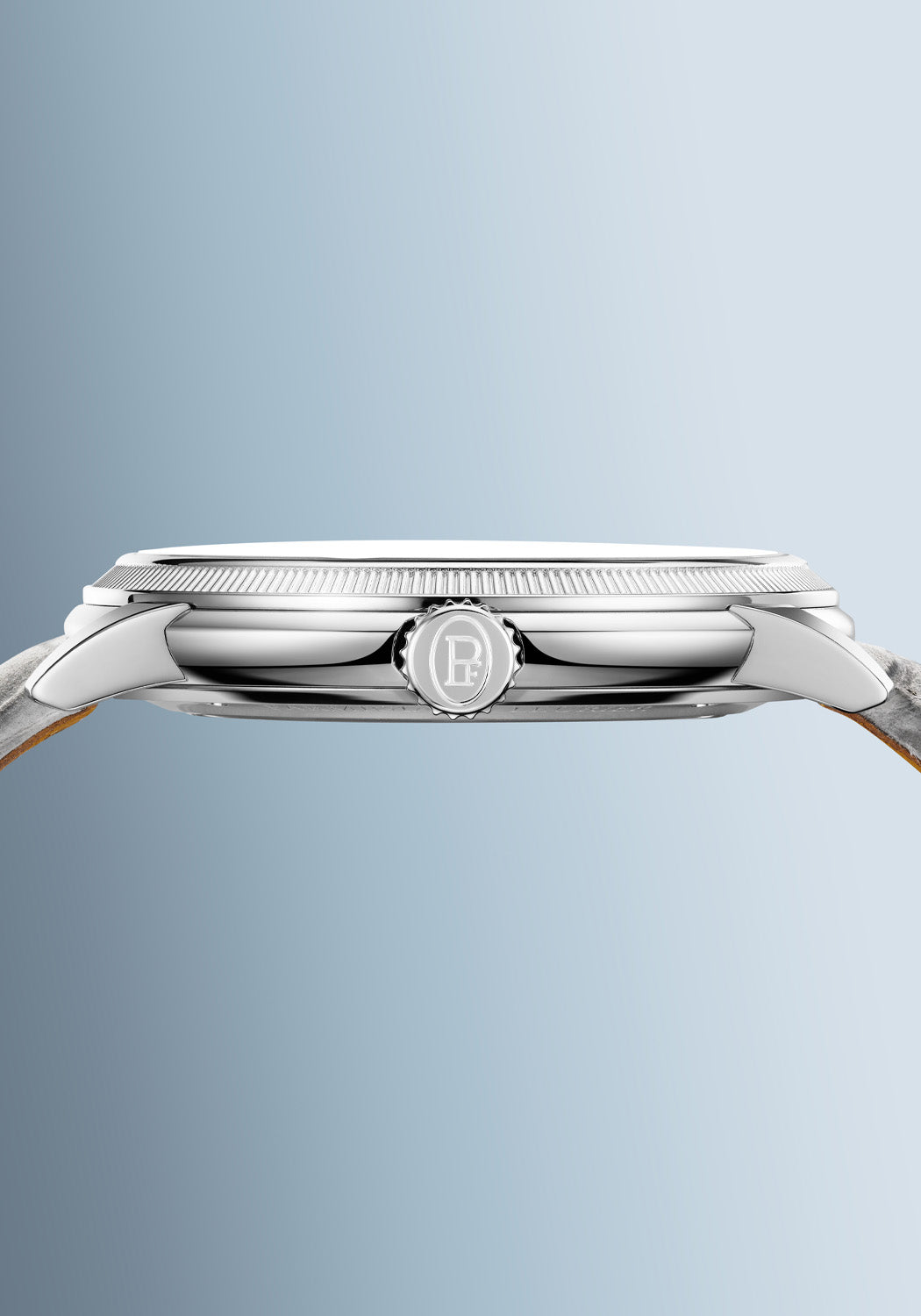 The slender case and distinctive crown of the Parmigiani Fleurier Toric Petite Seconde Morning Blue