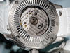 Sartory-Billard SB10 Jumping Hour Disco Ball Caseback (shown on rubber) | OsterJewelers.com
