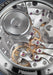 A closeup of the  Calibre ASE 320.00 shown through the sapphire glass exhibition caseback.