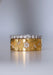 A simple Sethi Couture stack featuring the Fleur band and an 18KWG bezel set diamond eternity band.