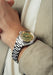 Singer Reimagined 1970 DualTrack Khaki on a man's wrist | Luxury Watches | OsterJewelers.com