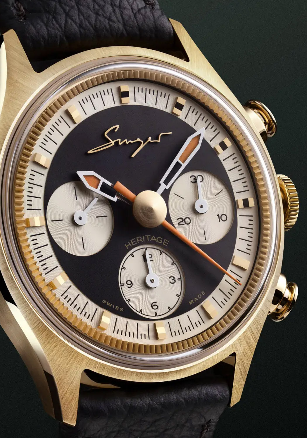 A closeup of the dial shows 3 white chronograph counters that stand out against the deep black dial
