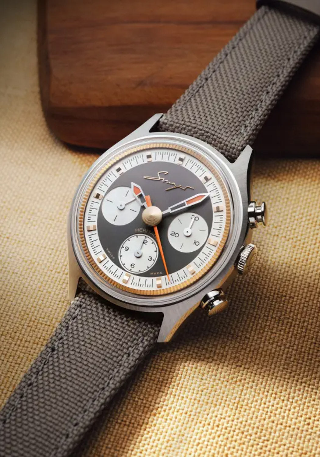 The Singer Reimagined Heritage V72 Stone-Gray Steel shows off 3 counters against a stone grey dial