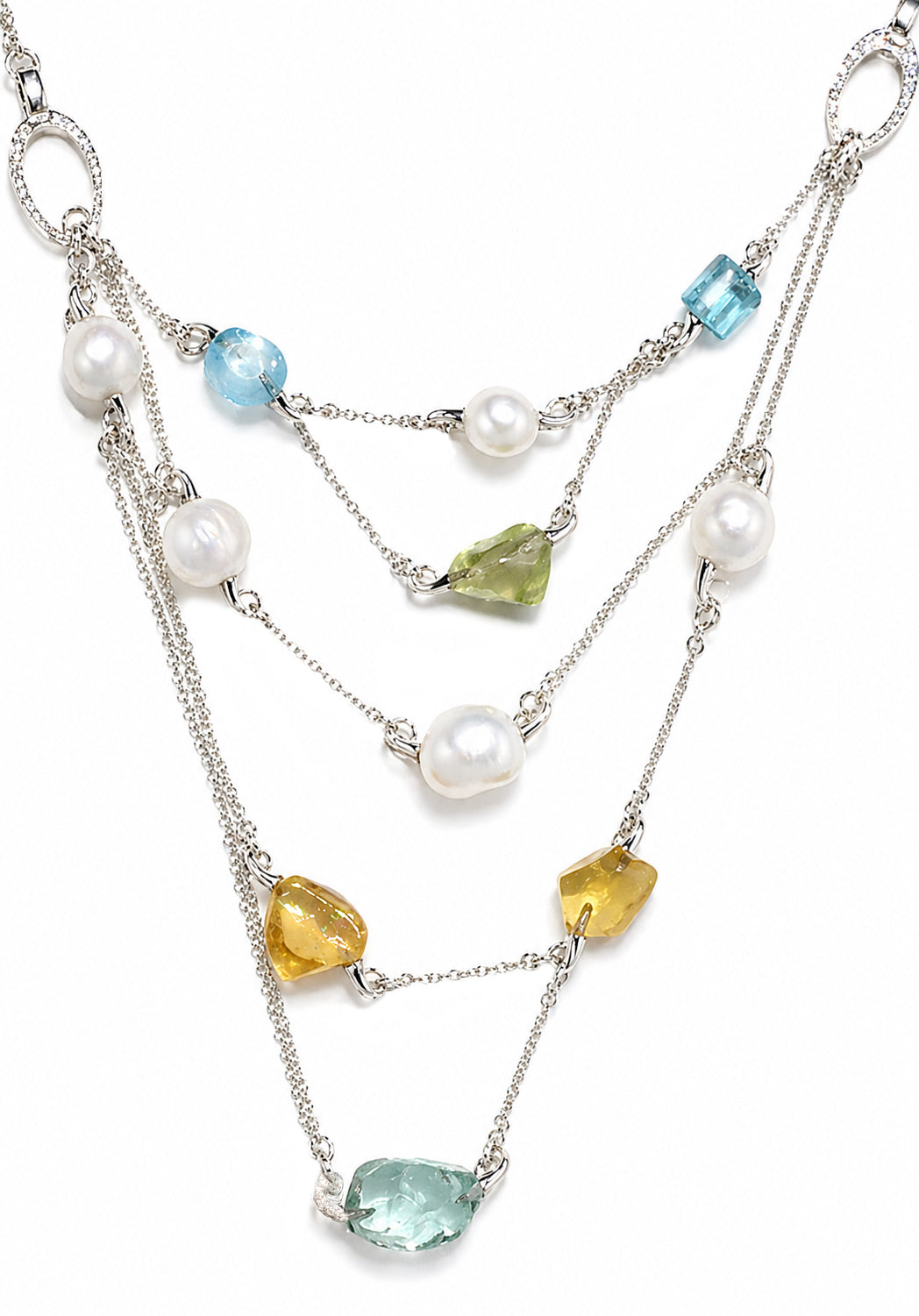 Multistrand necklace with pearls and various colored gemstones on a white background at Osterjewelers.com