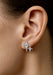 Closeup of a Sybarite Falling Stars 18KWG Diamond Double Star Stud Earring on a model's ear