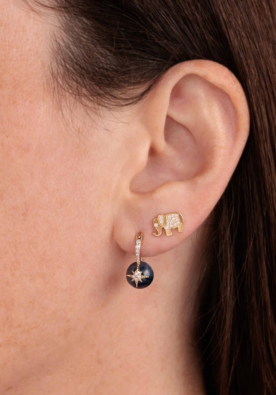 Sydney Evan Gold & Diamond Starburst Kyanite Earrings shown on a model's ear with an elephant stud.