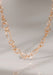 Ole Lynggaard Love 18KYRG Small Twisted Chain Link Collier Necklace gently swaying