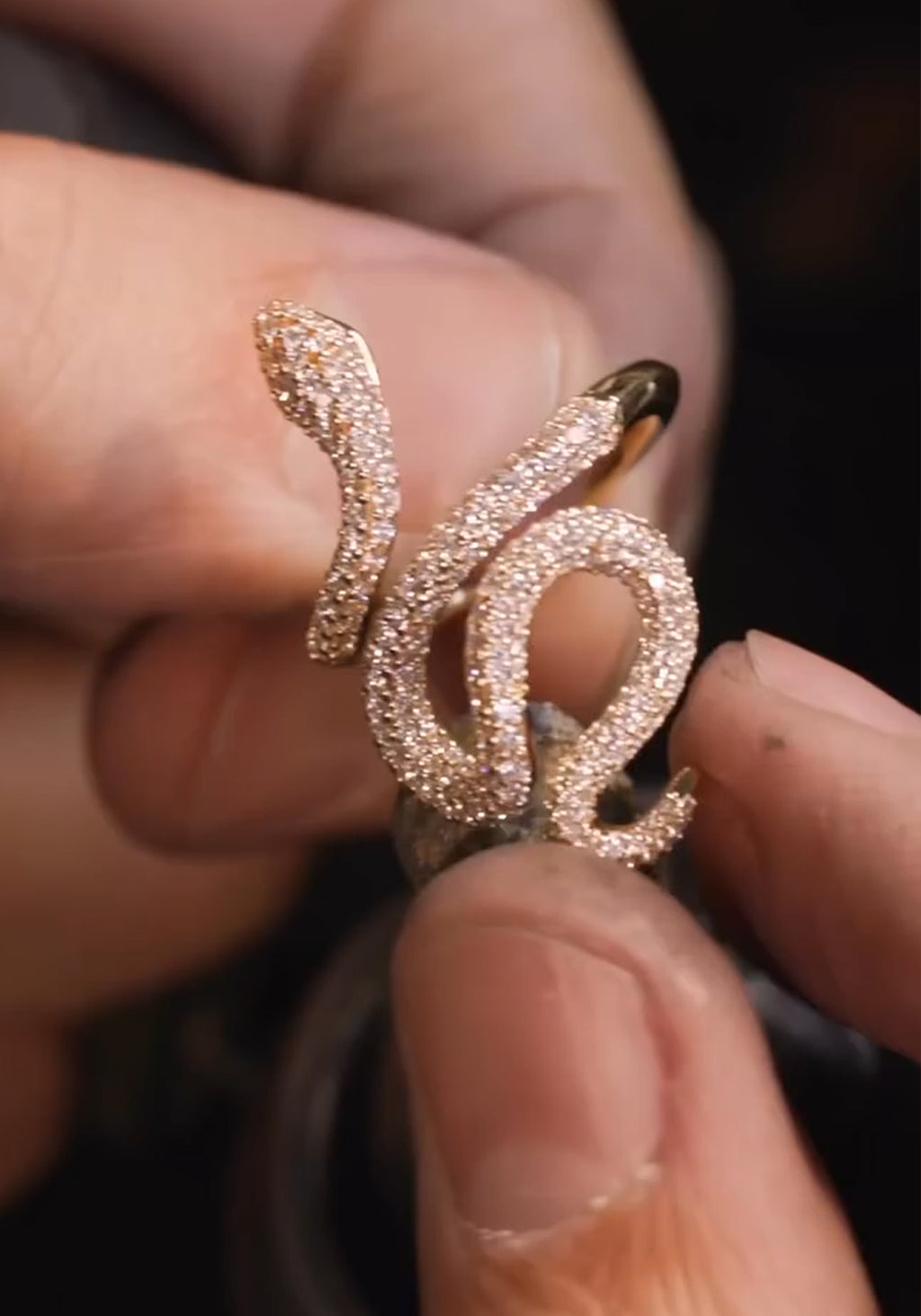 Ole Lynggaard Pavé Diamond Snake Ring displayed to show movement