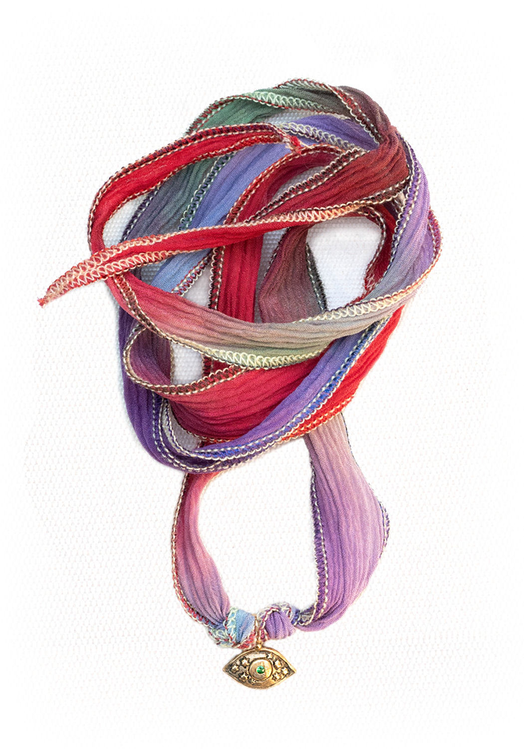 Catherine Michiels Bronze Tsavorite Evil Eye Charm Silk Wrap Bracelet | OsterJewelers.com