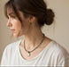 Catherine Michiels Bronze Slow Life Dalmatian Jasper Necklace | OsterJewelers.com